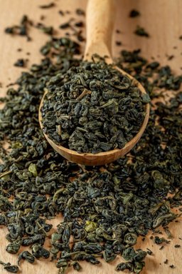 Dried green tea leaves